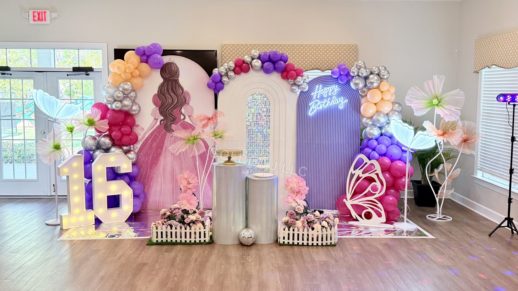 Pink and purple sweet sixteen event display
